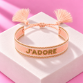 Bracelet Rosalia tisse J'adore pompons rose – Mgx Bijoux